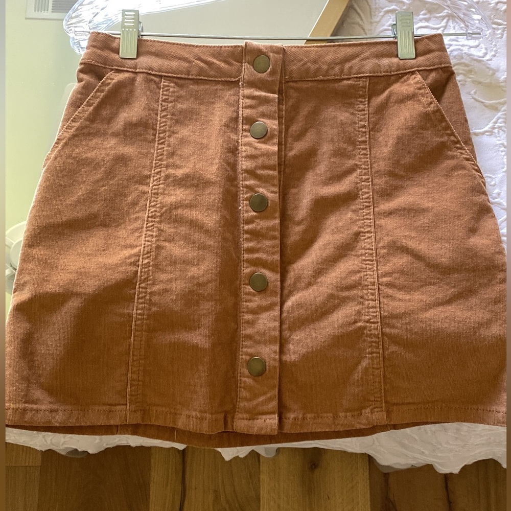 Camel colored skirt! Buttons all the way down. Worn once.